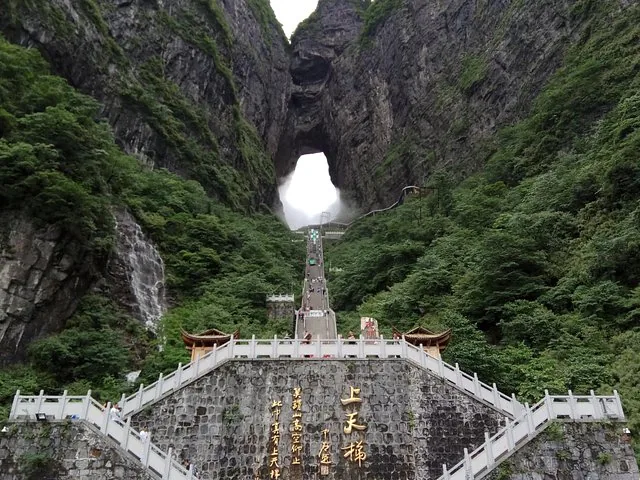 Fog rolling through Tianmen Cave above the Stairway to Heaven