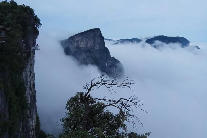Cliffside walkway on Tianmen Mountain overlooking a thick sea of clouds